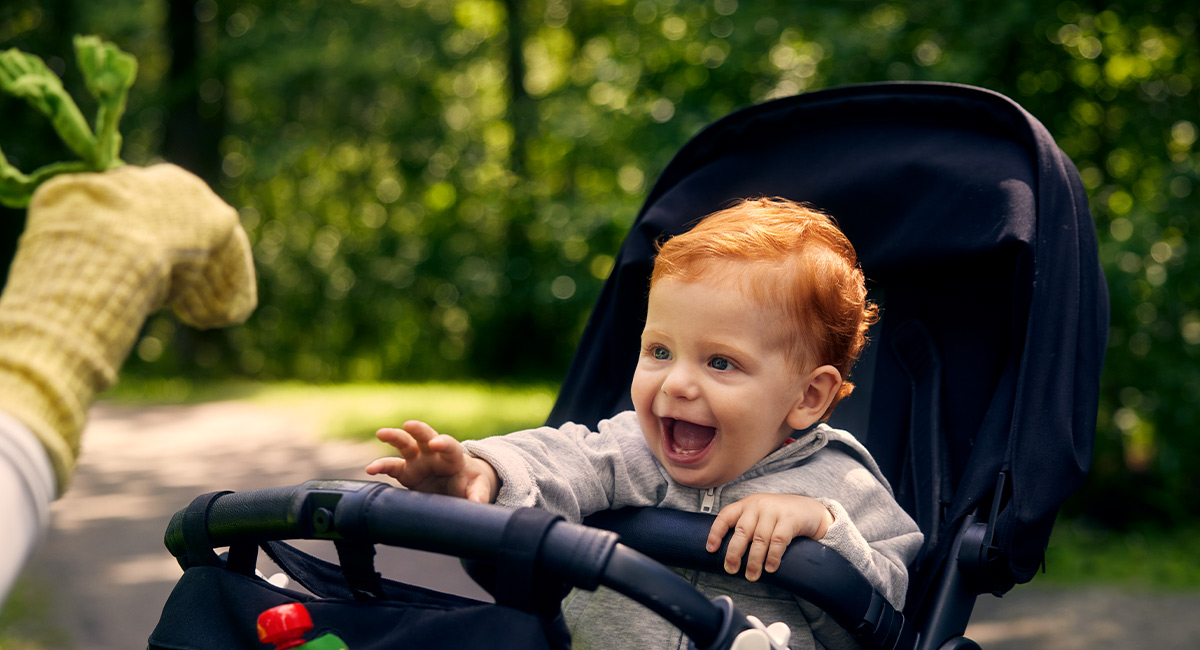 Banner happy child in stroller