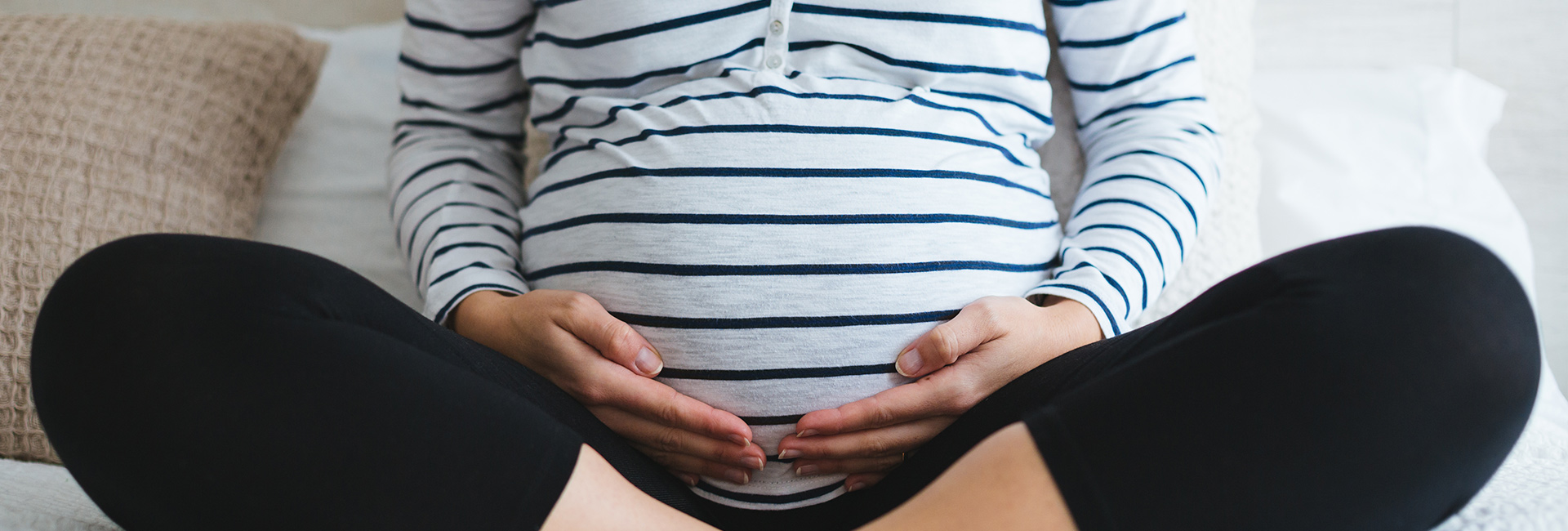 pregnant woman in striped top